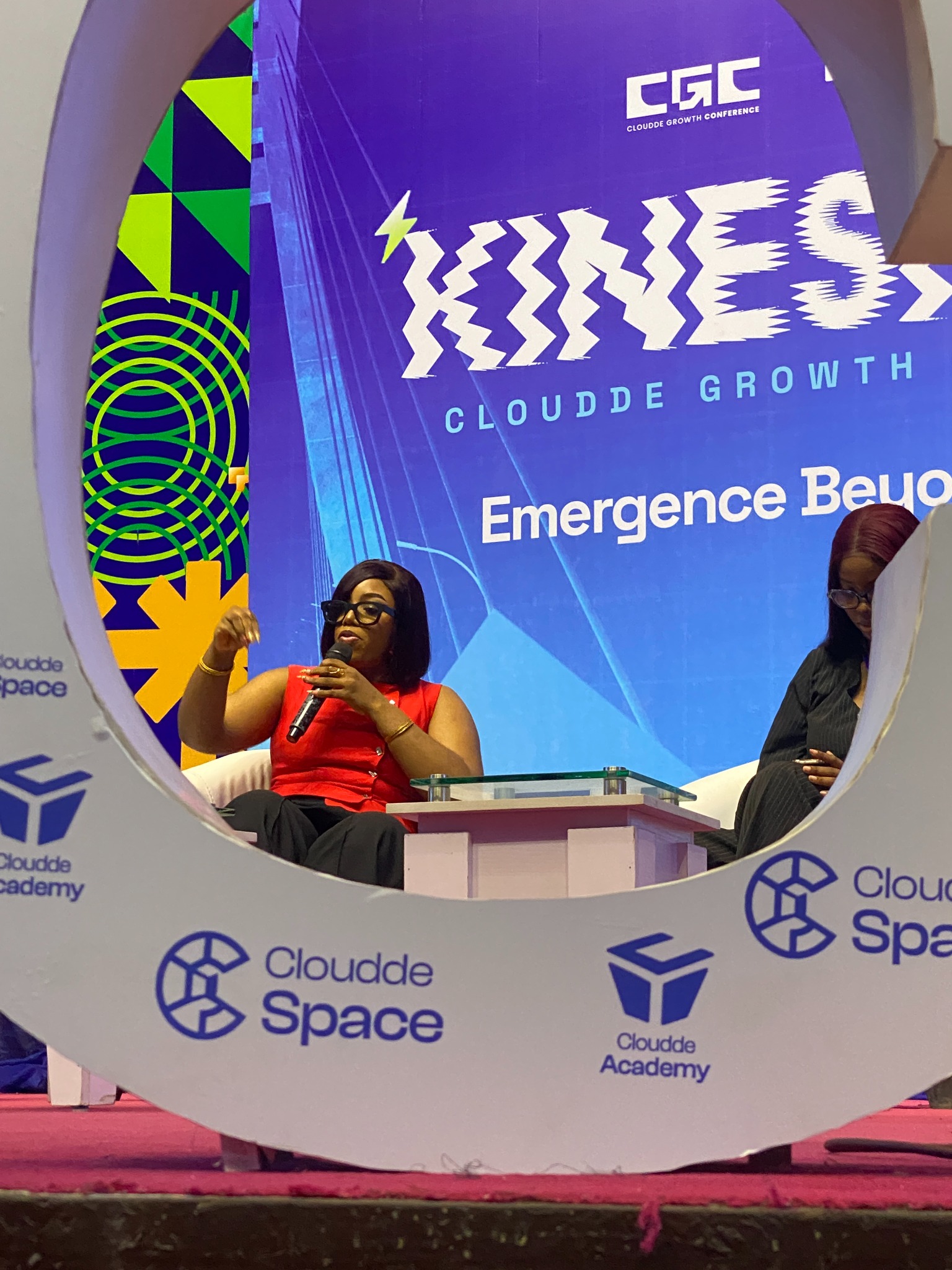 Fortune Nwosu speaking on a panel at the Cloudde Growth Conference